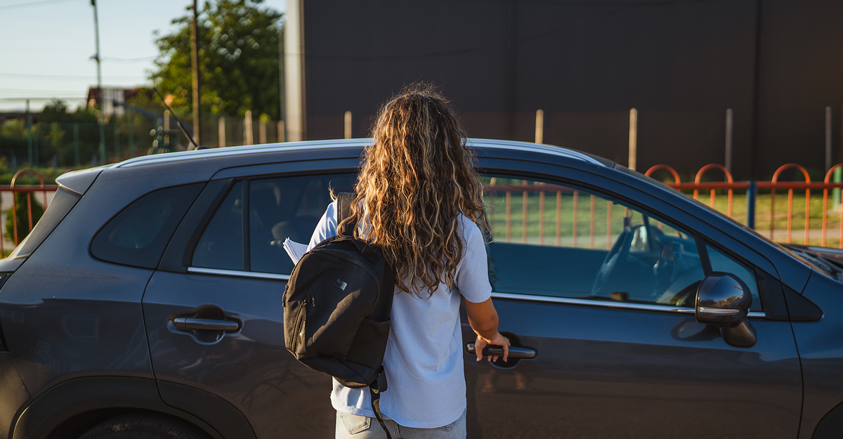 Student with their first used car in Quebec