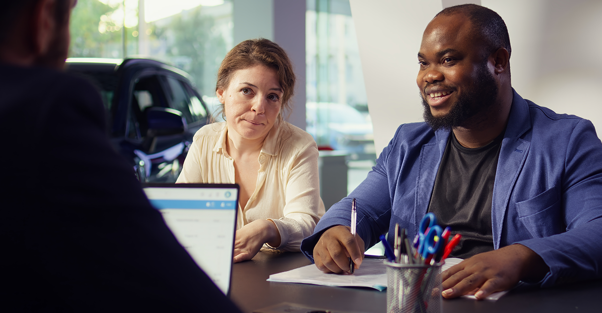 Financing advisor explaining weekly payments