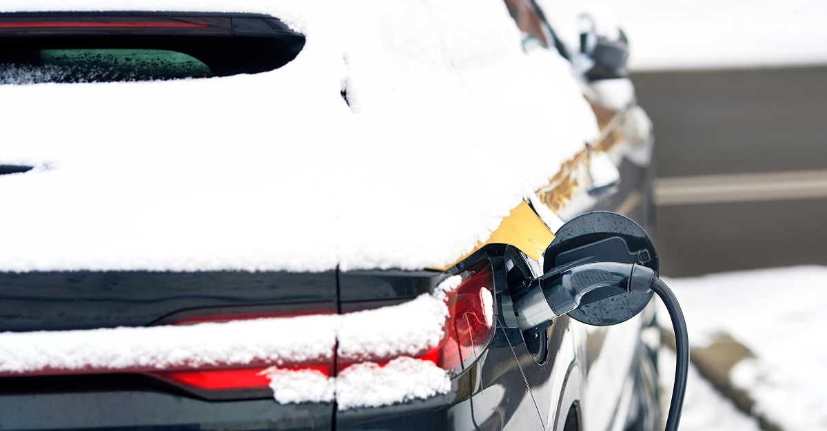 Electric vehicle dashboard showing range in cold weather